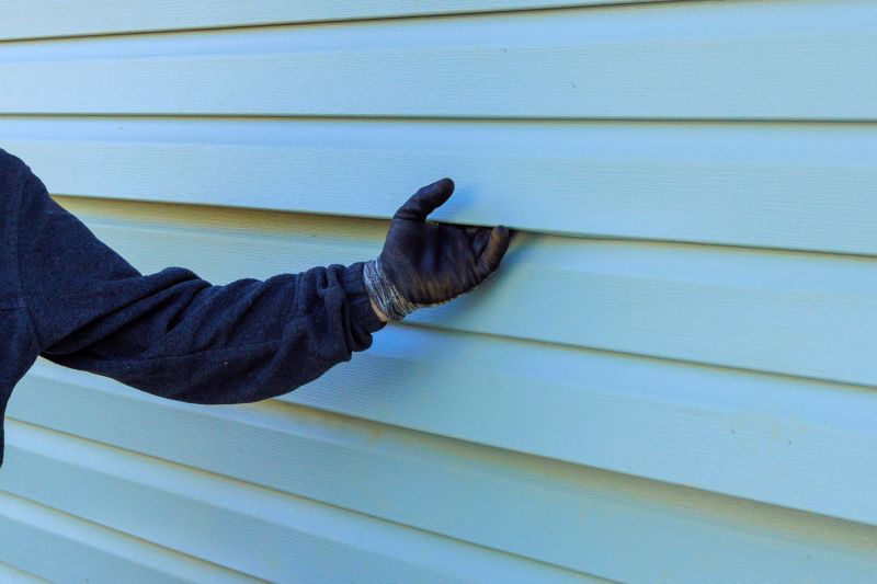 Seamless Vinyl Siding Application